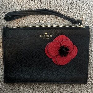 kate spade Black Leather Wristlet with Red Flower Applique